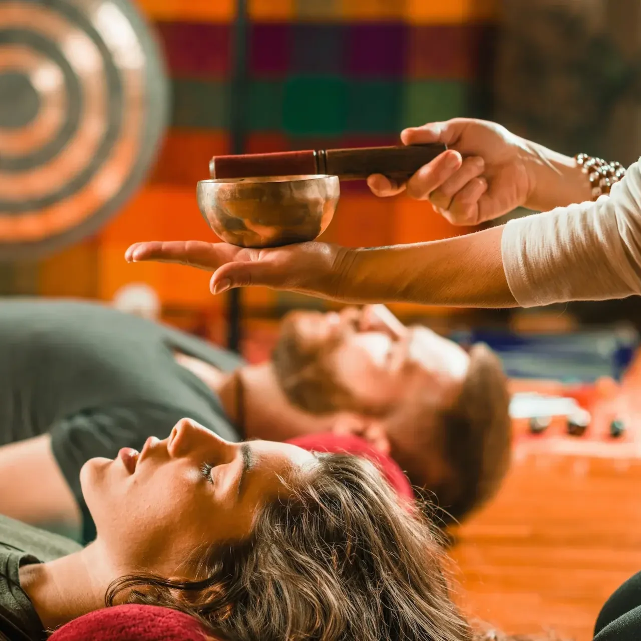 Floating singing bowl therapy
